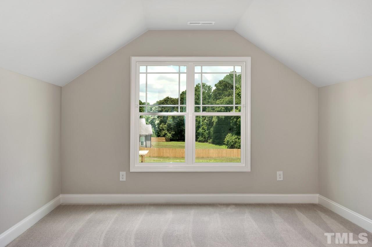 6733 Dwight Rowland Road Willow Spring, NC 27592 - Photo 22 of 25 Second floor 4th bedroom w full bathroom adjoining.