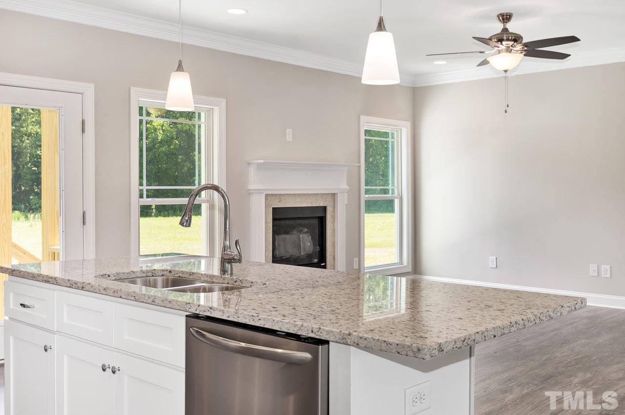 6733 Dwight Rowland Road Willow Spring, NC 27592 - Photo 7 of 25 Another view of living large is the open space concept
