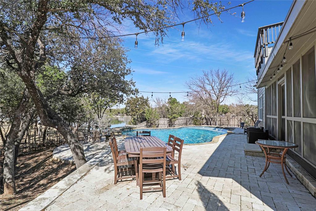 4843 Pike Road Graham, TX 76450 - Photo 5 of 37 Outdoor Dining Area off the Screened In Porch & Fire Pit area