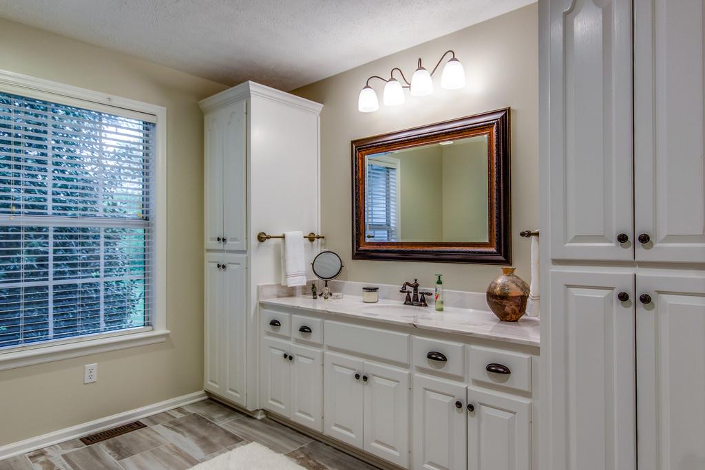 4021 Trinity Road Franklin, TN 37067 - Photo 20 of 30 a bathroom with a sink vanity and mirror