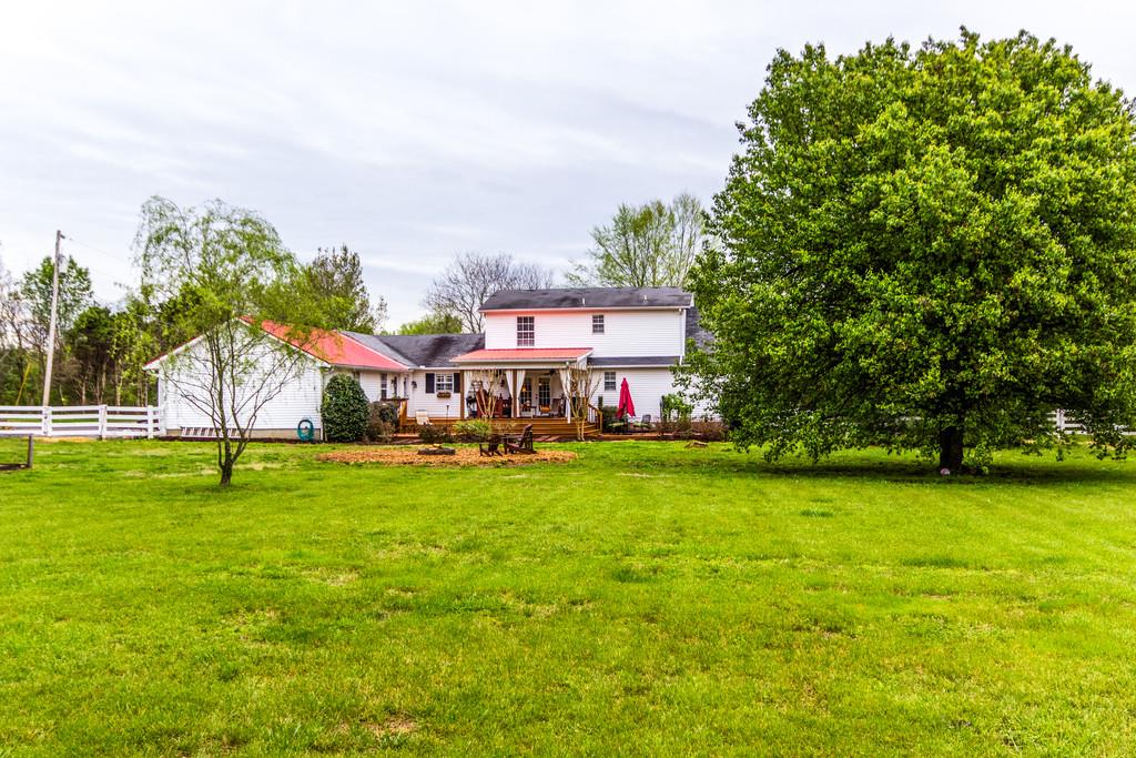 4021 Trinity Road Franklin, TN 37067 - Photo 28 of 30 a view of a house with a big yard and large trees