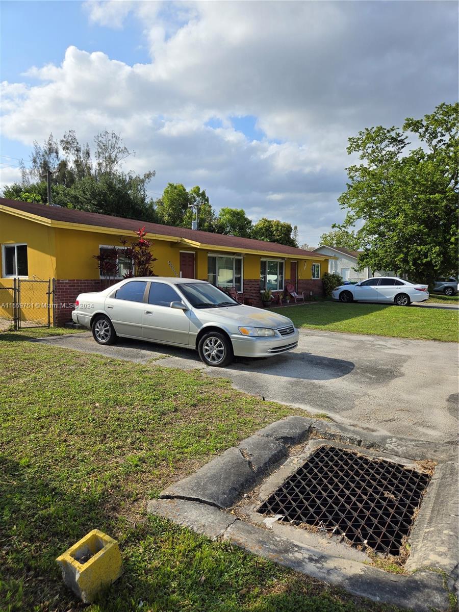 Miramar Miramar, FL 33025 - Photo 2 of 7 a car parked on the side of the road