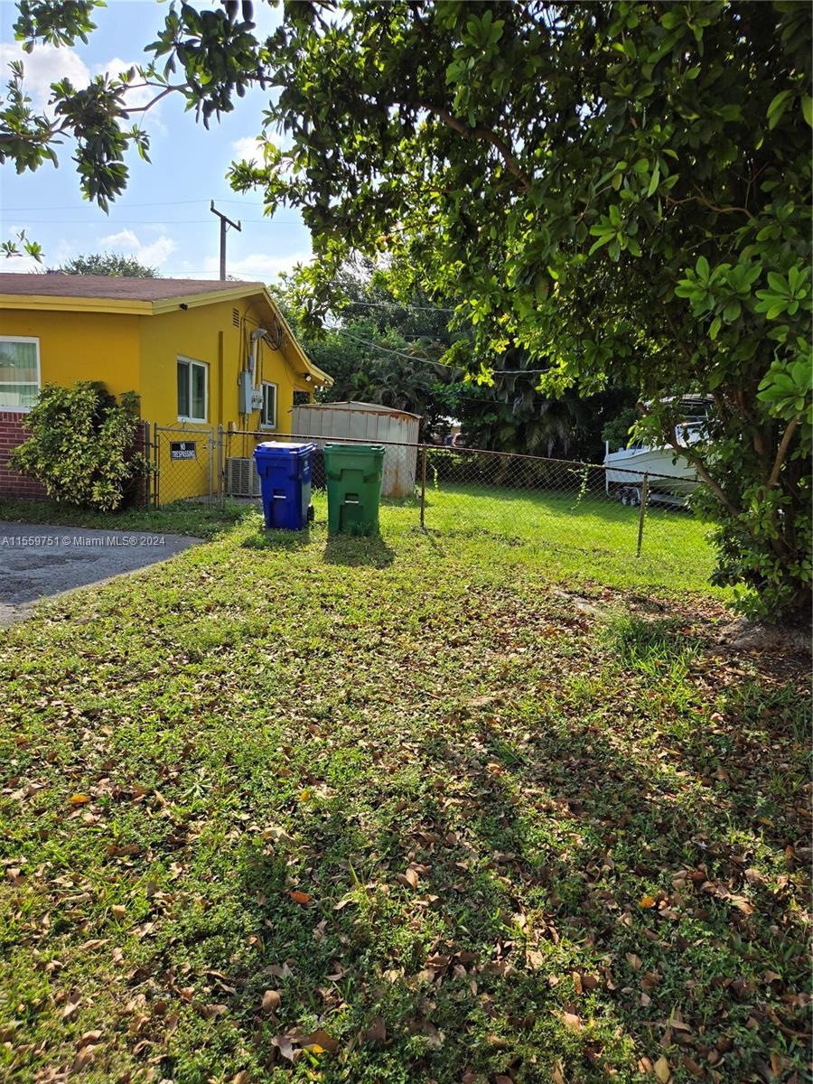 Miramar Miramar, FL 33025 - Photo 3 of 7 a view of a house with a yard