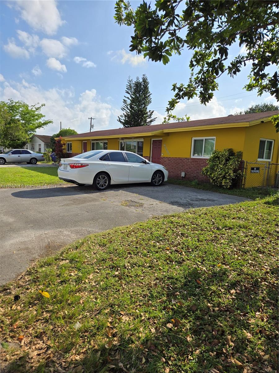 Miramar Miramar, FL 33025 - Photo 6 of 7 a view of a house with a garden