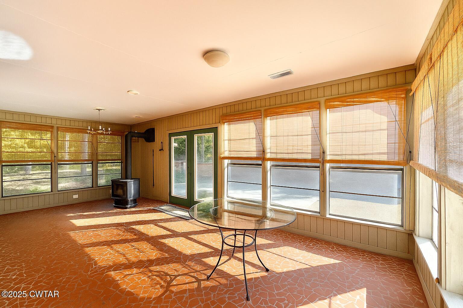 459 Liberty Road Beech Bluff, TN 38313 - Photo 11 of 32 a spacious bedroom with a large window and a table