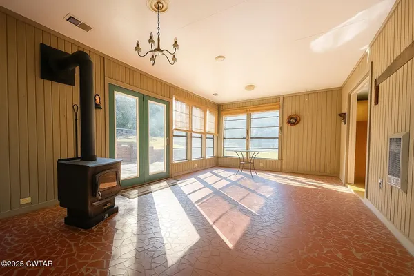a view of hallway with a large window