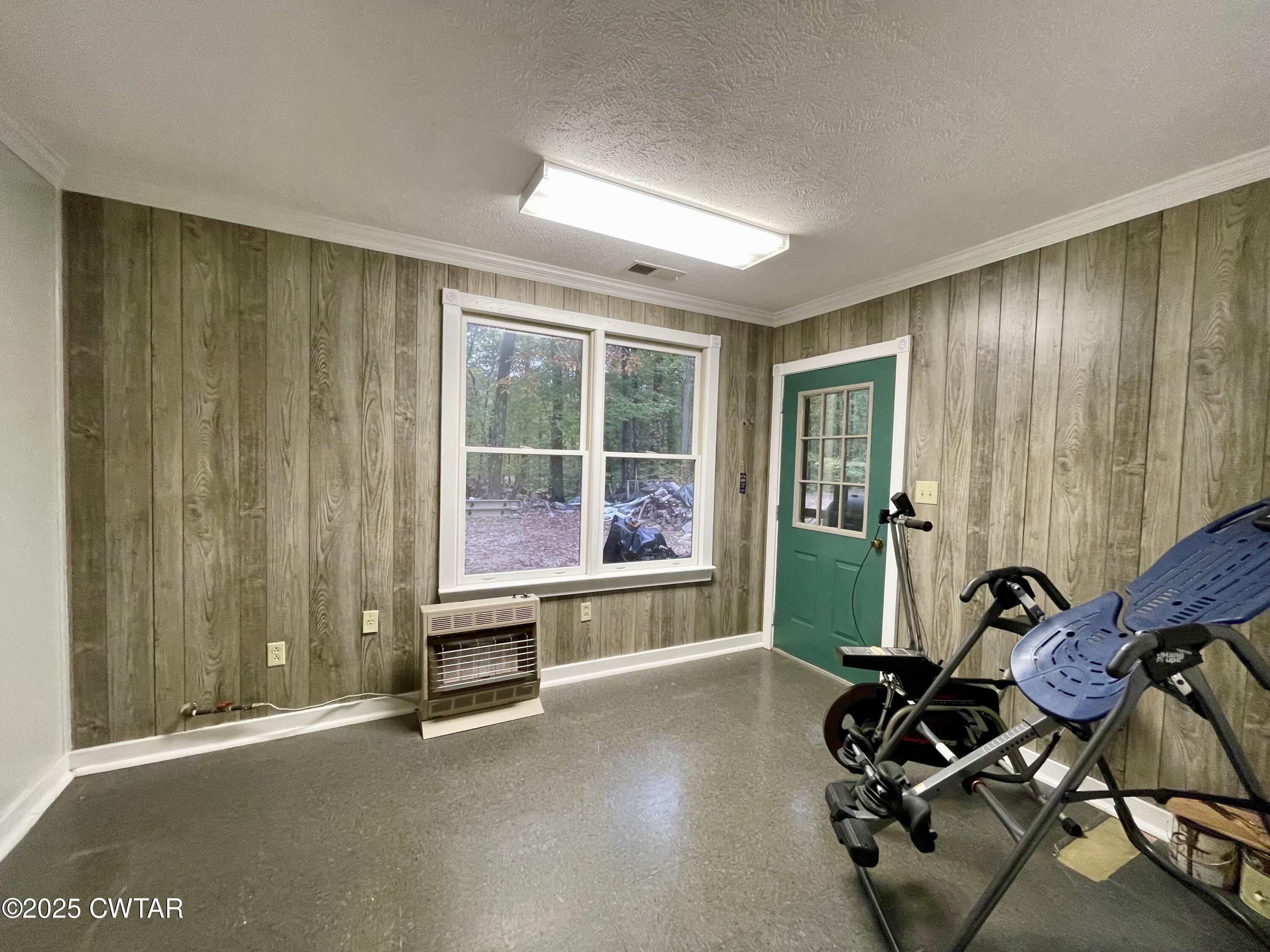 459 Liberty Road Beech Bluff, TN 38313 - Photo 17 of 32 a view of a room with gym equipment