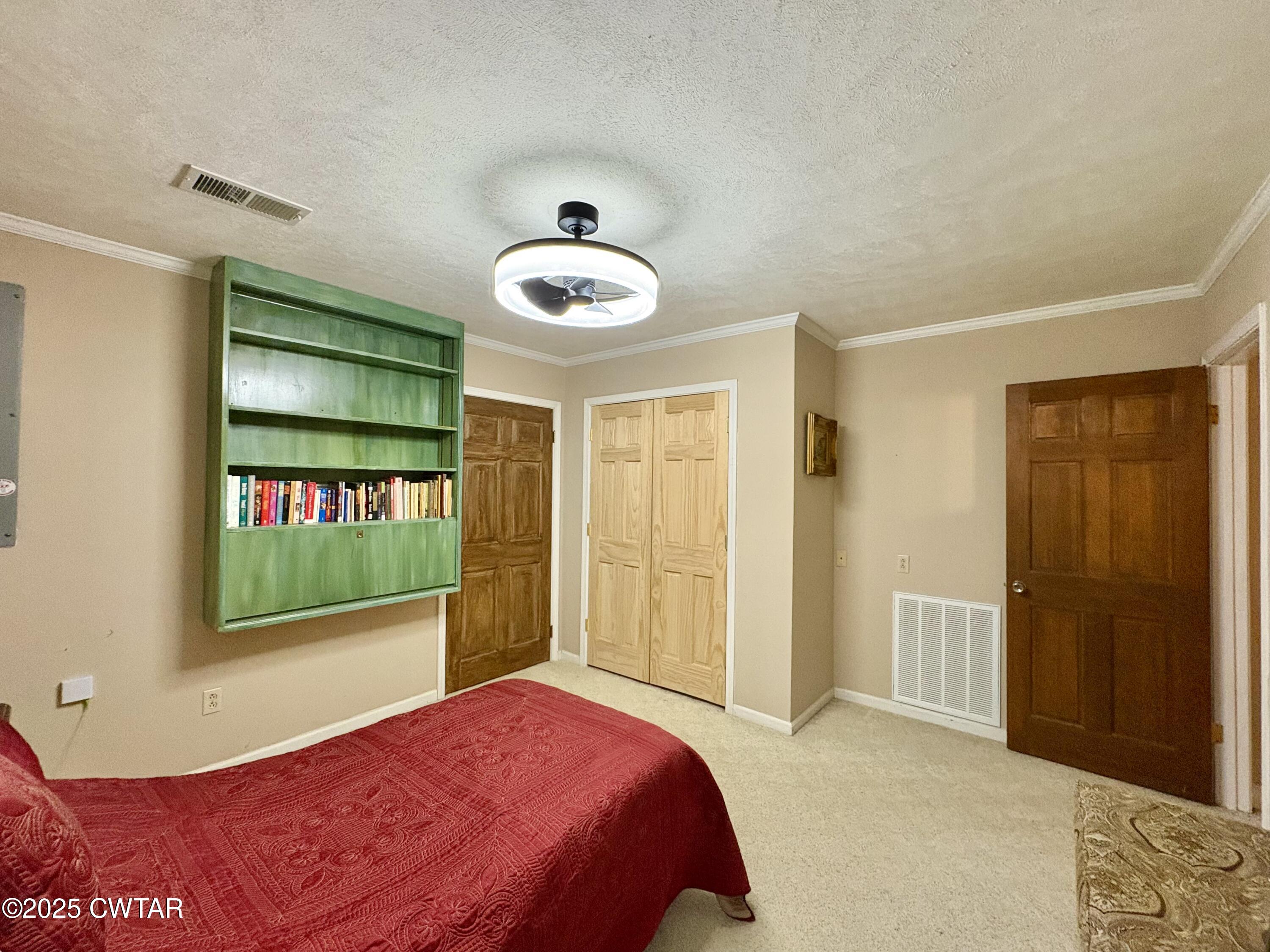 459 Liberty Road Beech Bluff, TN 38313 - Photo 21 of 32 a bedroom with a bed and a window