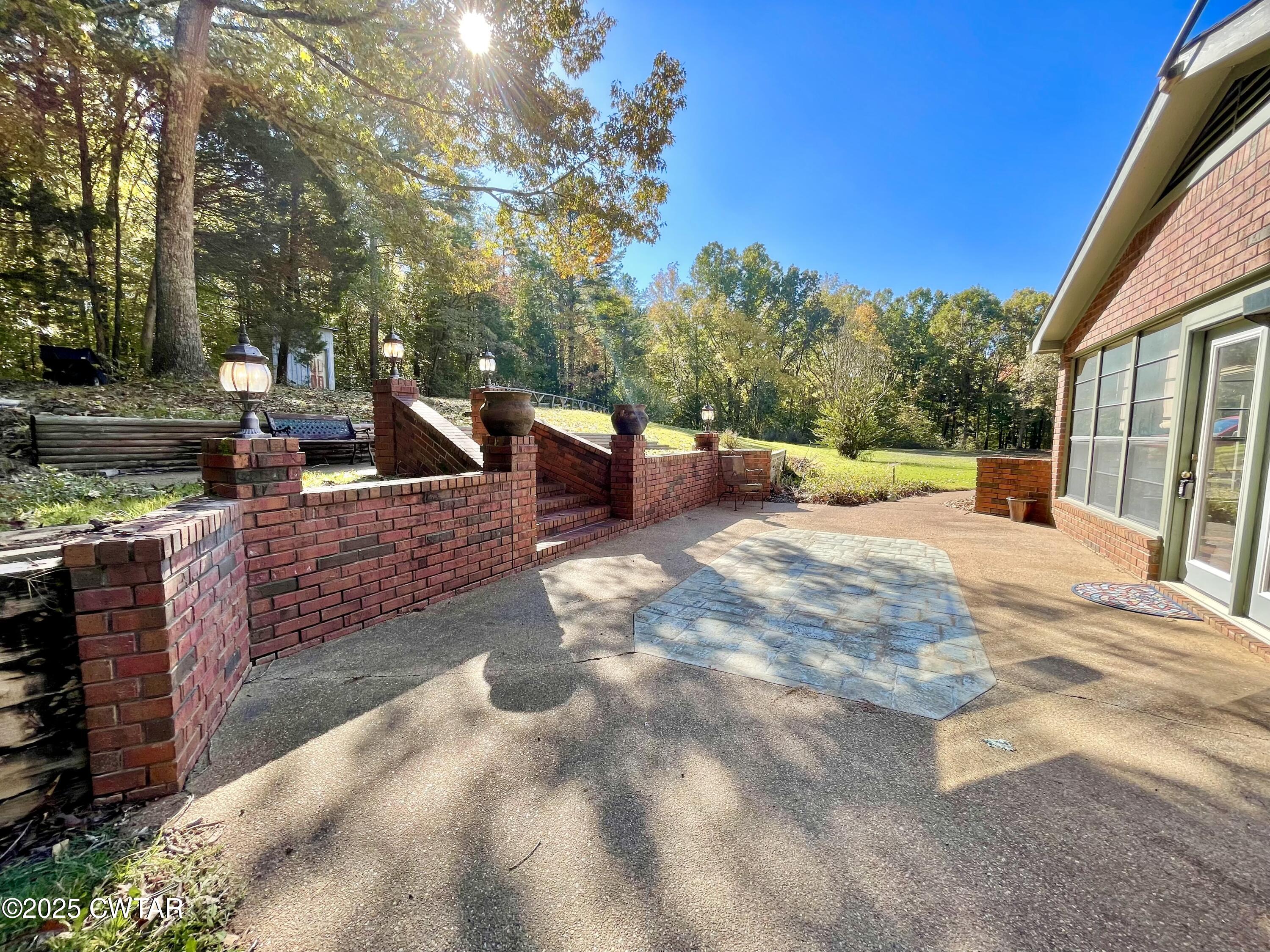 459 Liberty Road Beech Bluff, TN 38313 - Photo 26 of 32 a view of a swimming pool with a patio