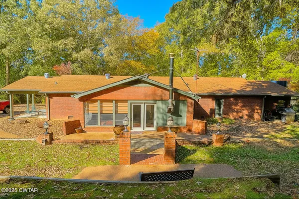 a view of a house with swimming pool