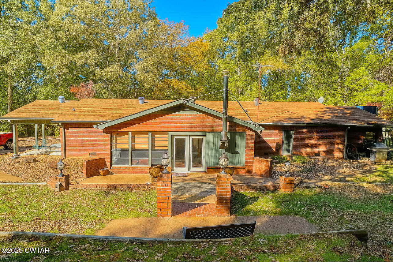 459 Liberty Road Beech Bluff, TN 38313 - Photo 27 of 32 a view of a house with swimming pool