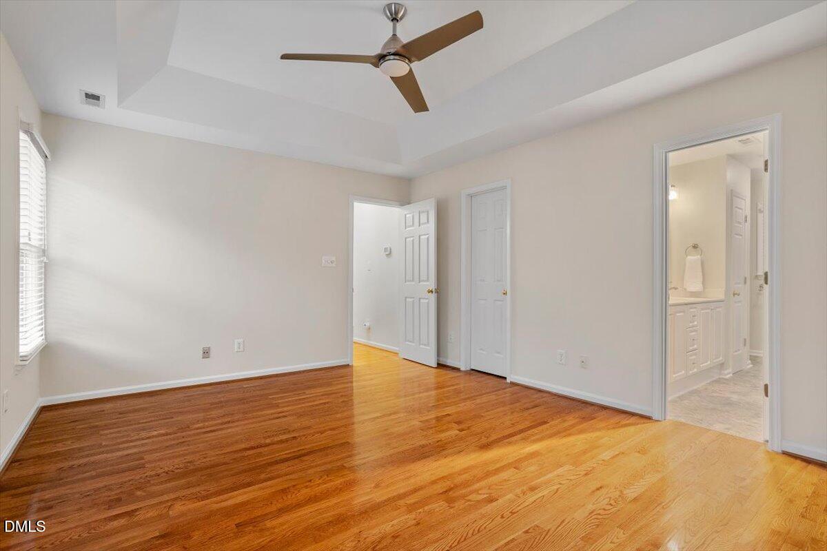 2628 Crofton Springs Drive Raleigh, NC 27615 - Photo 20 of 33 a view of empty room with wooden floor