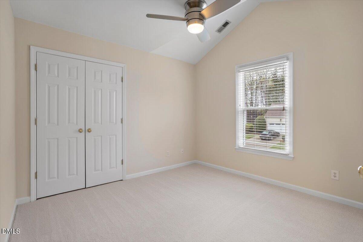 2628 Crofton Springs Drive Raleigh, NC 27615 - Photo 27 of 33 an empty room with a window