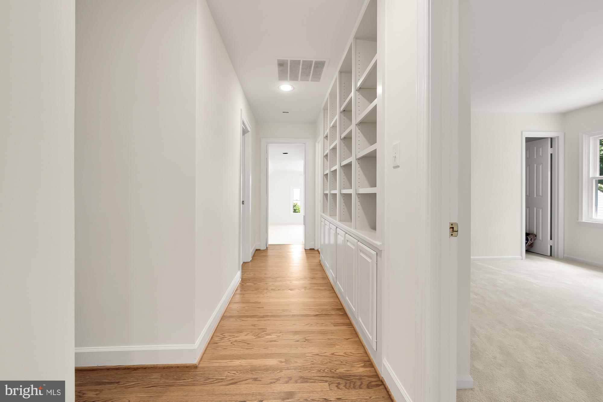 8909 Bells Mill Road Potomac, MD 20854 - Photo 36 of 71 Upper level hallway with built ins