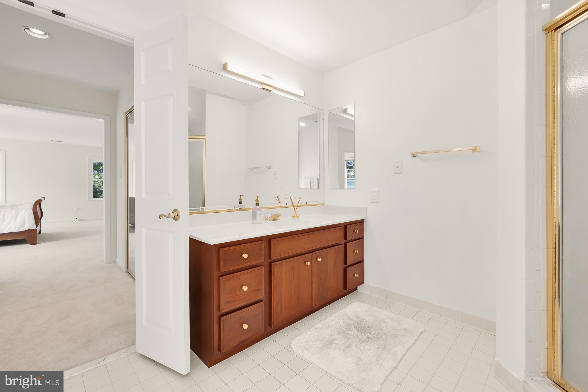 8909 Bells Mill Road Potomac, MD 20854 - Photo 41 of 71 Primary bathroom vanity 1