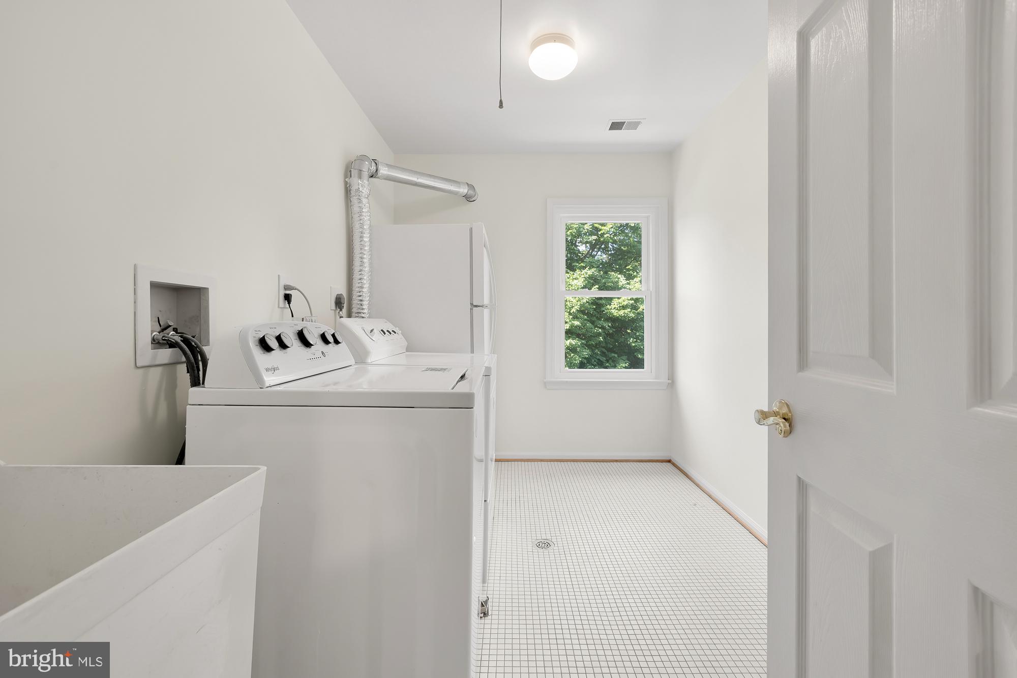 8909 Bells Mill Road Potomac, MD 20854 - Photo 46 of 71 Upper level laundry room
