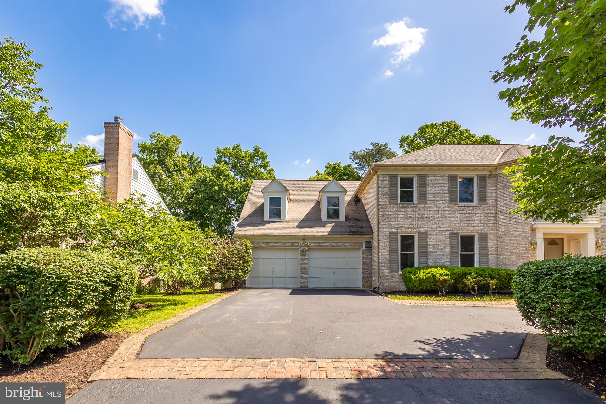 8909 Bells Mill Road Potomac, MD 20854 - Photo 67 of 71 Facade, driveway, two-car garage