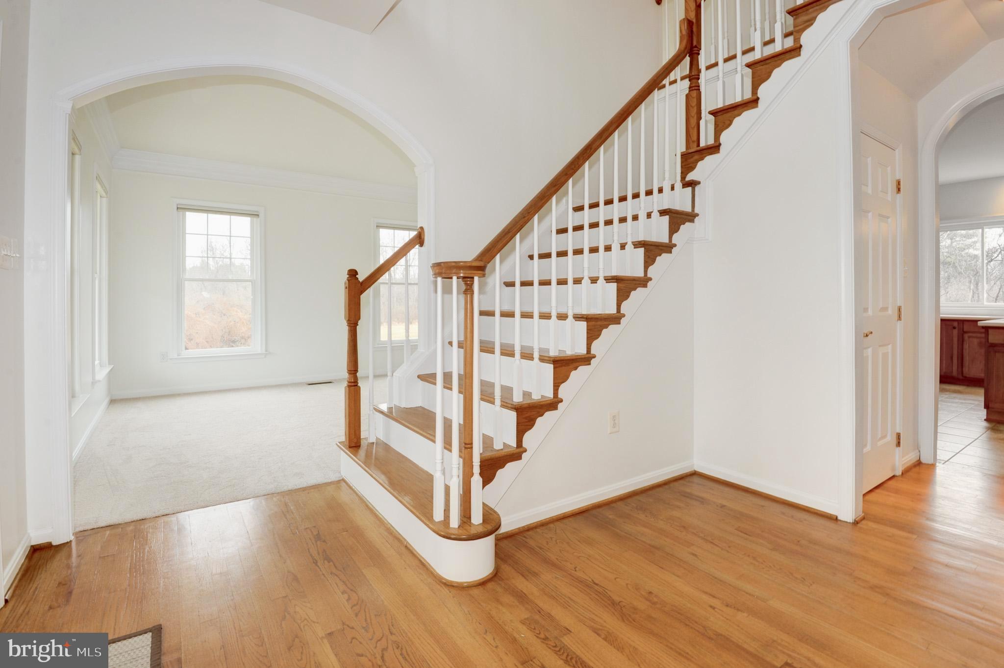 14340 Milltown Road Waterford, VA 20197 - Photo 6 of 84 Foyer with Hardwood floors & Arched Openings