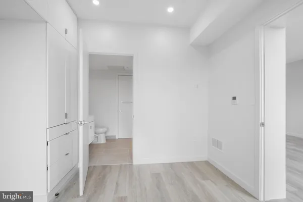 a view of bathroom with a sink and a toilet