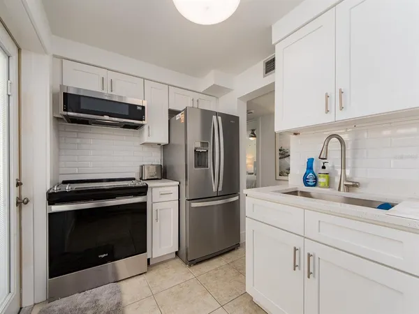 $3,000 | 241 Skiff Point, Unit 1, Clearwater Beach, FL 33767