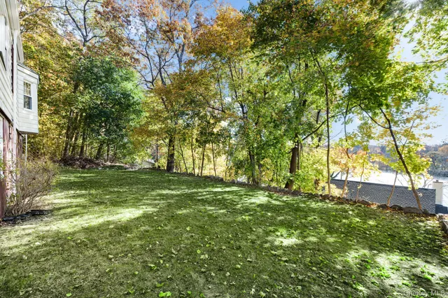 a view of a house with a big yard
