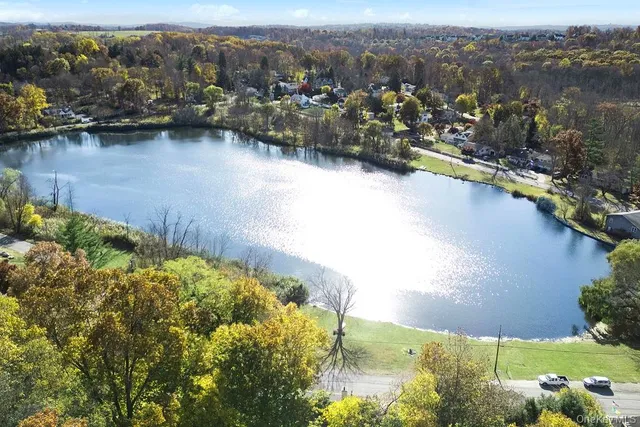 a view of a lake with mountains in the background