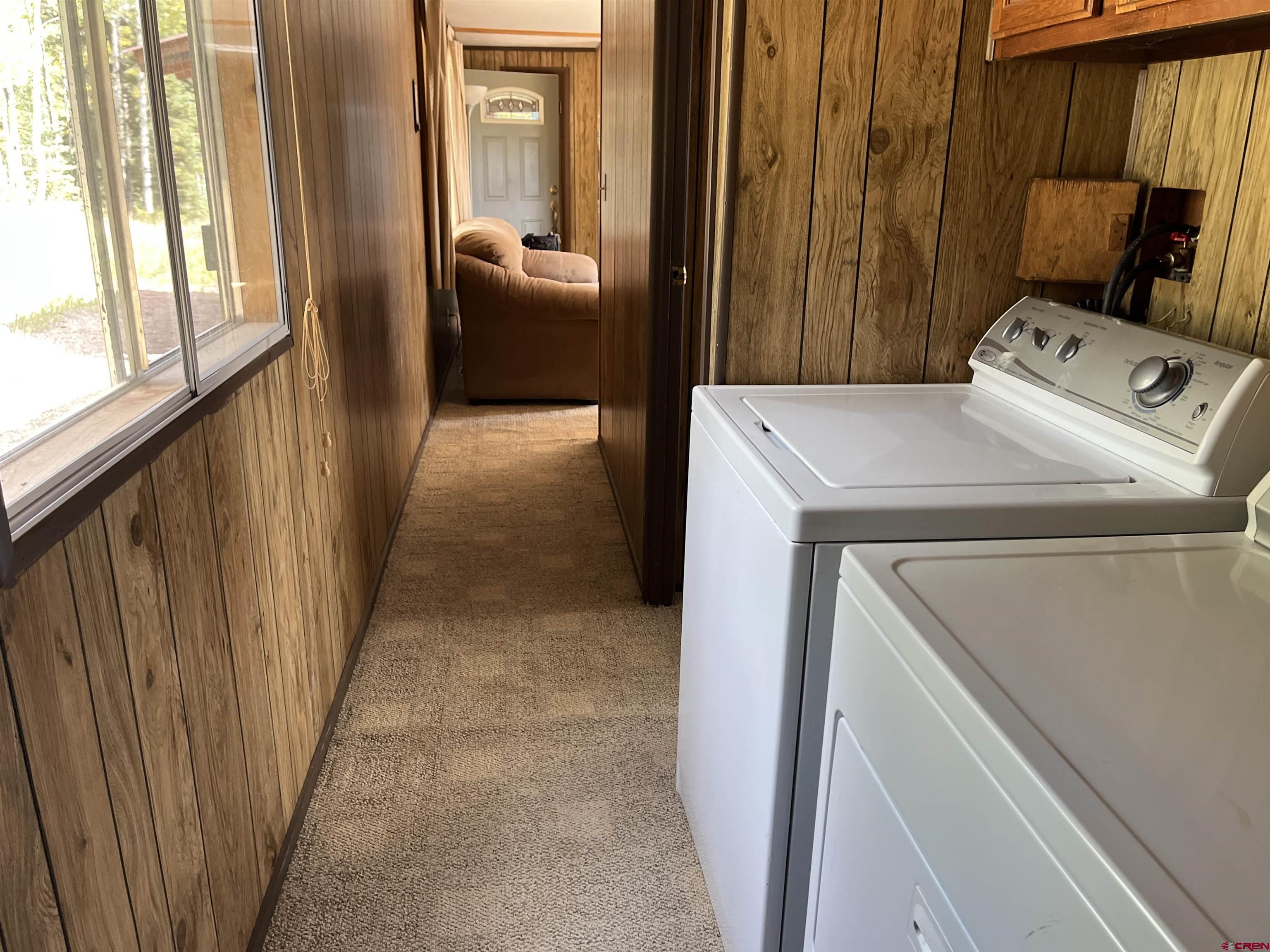 320 Forest Service Road Pitkin, CO 81241 - Photo 6 of 16 a utility room with dryer and washer