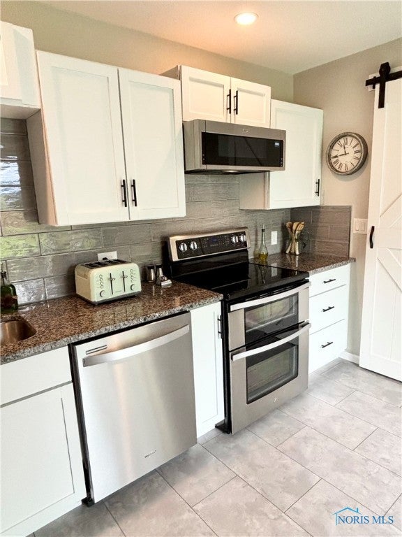 162 North Wynn Road Oregon, OH 43616 - Photo 20 of 50 Stainless steel appliances.