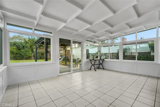 a view of an empty room with windows