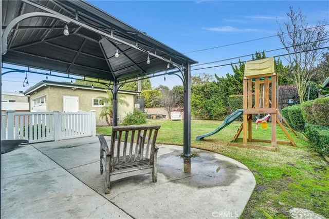a view of a porch with a small yard