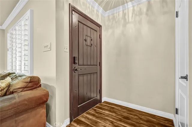 a view of bedroom with furniture and closet