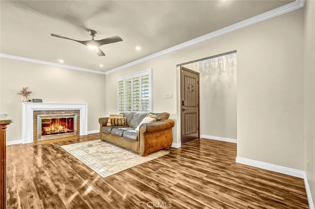 a bedroom with furniture and a fireplace