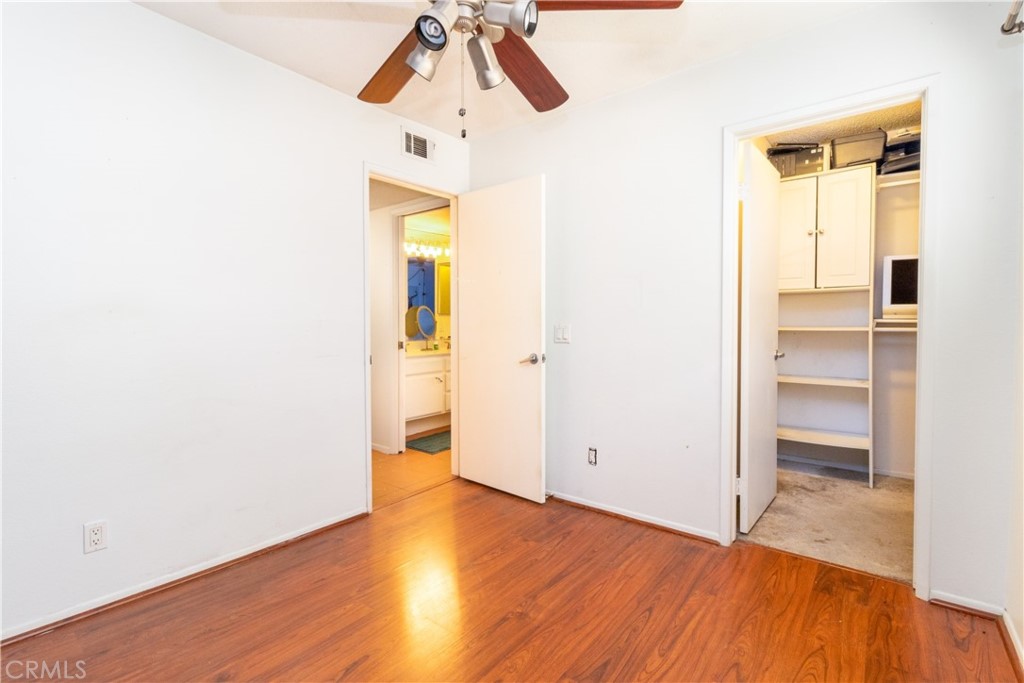 550 Orange Avenue, Unit 318 Long Beach, CA 90802 - Photo 18 of 25 an empty room and wooden door