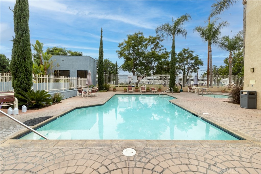 550 Orange Avenue, Unit 318 Long Beach, CA 90802 - Photo 24 of 25 a view of a backyard patio and swimming pool