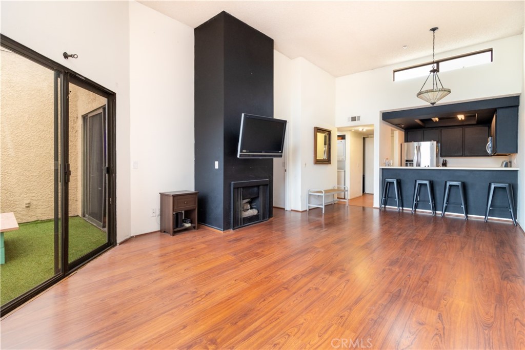 550 Orange Avenue, Unit 318 Long Beach, CA 90802 - Photo 6 of 25 a view of a livingroom with furniture and a flat screen tv
