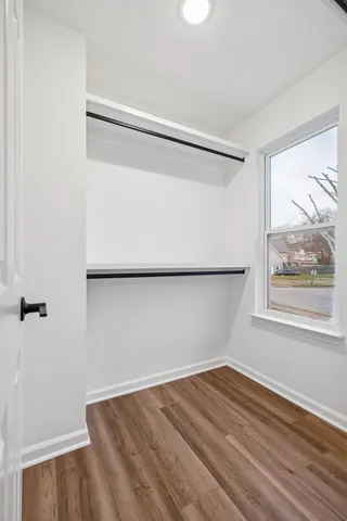 a white bath tub sitting in a bathroom