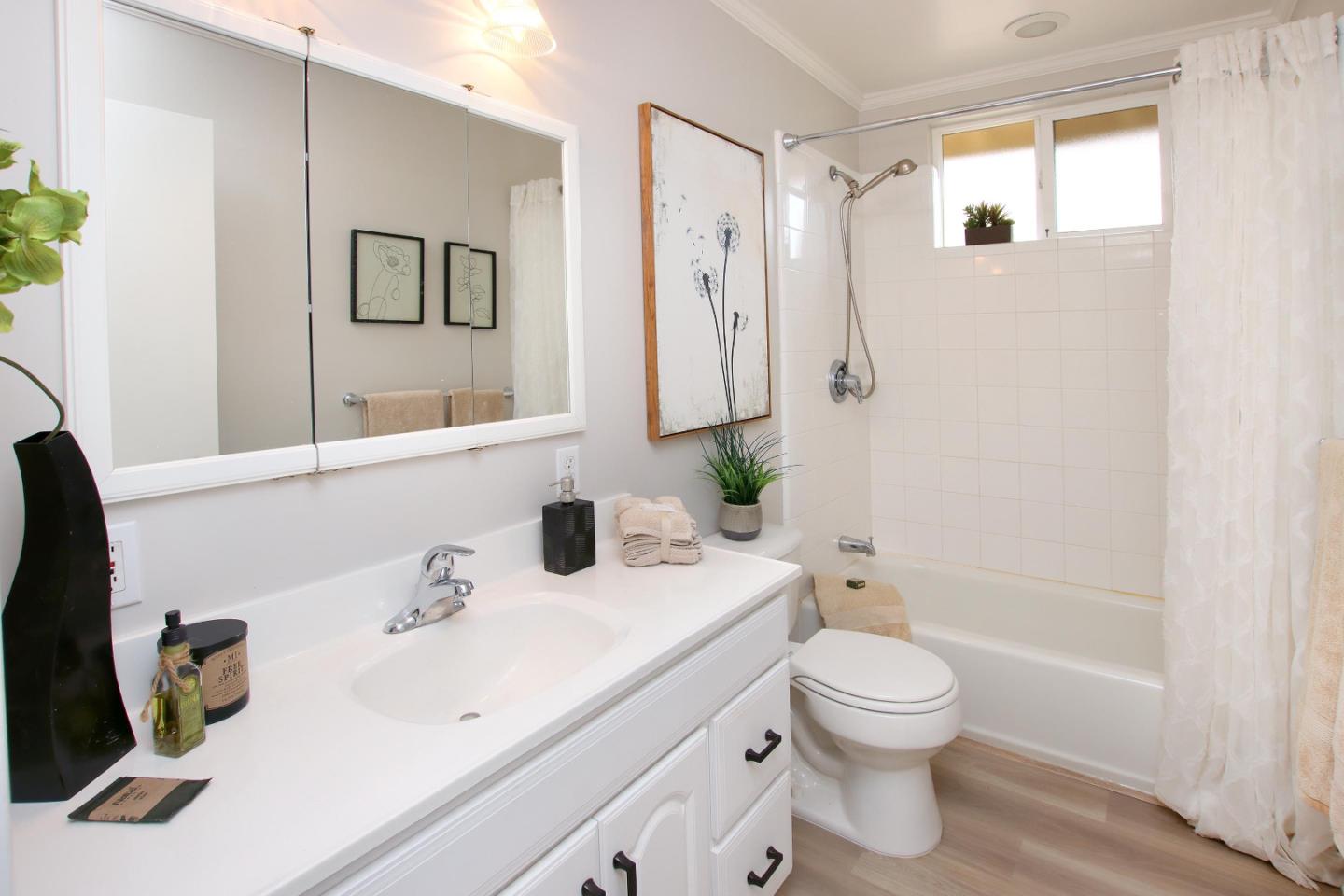 3005 Granite Creek Road Scotts Valley, CA 95066 - Photo 19 of 26 a bathroom with a sink a toilet and shower