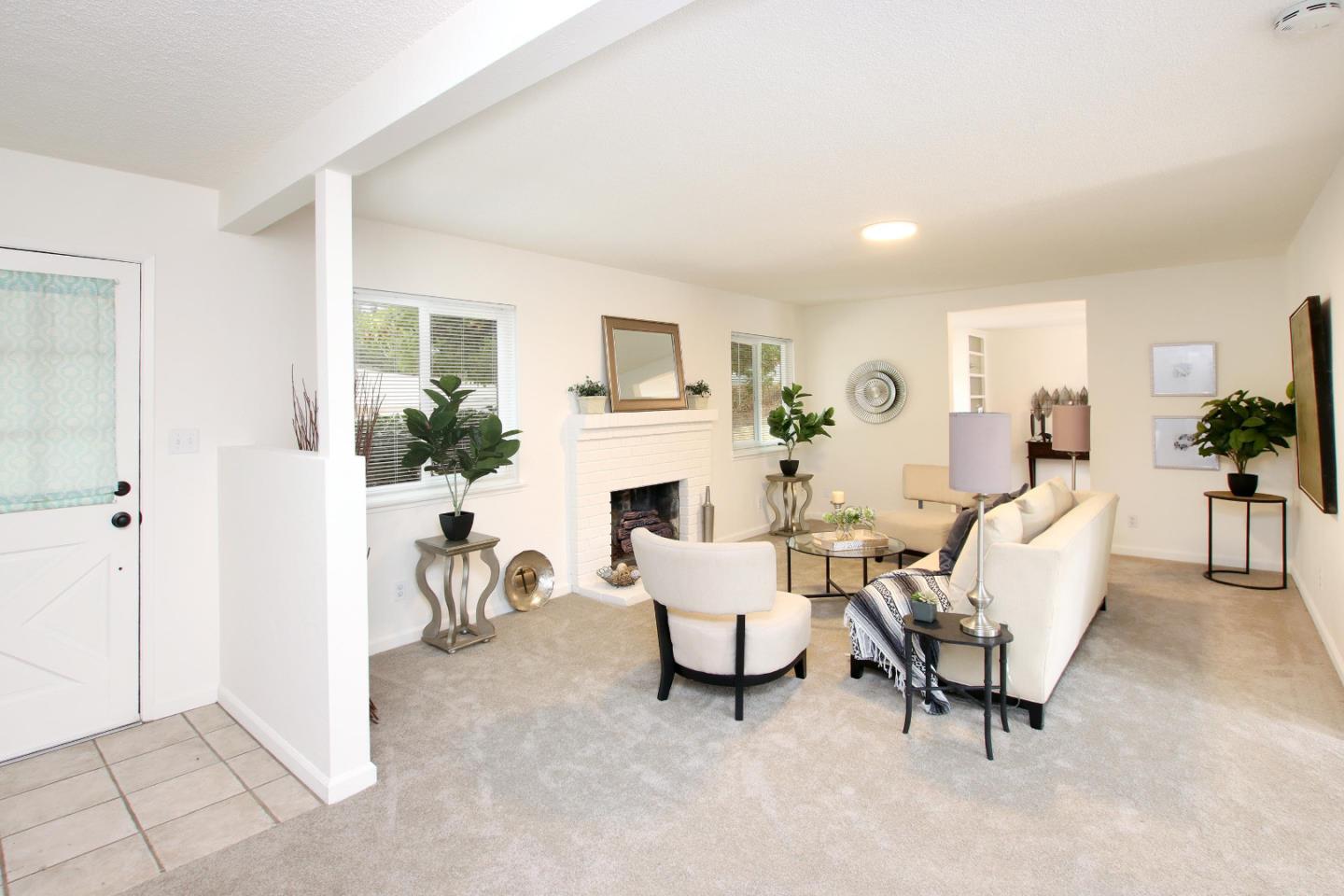 3005 Granite Creek Road Scotts Valley, CA 95066 - Photo 2 of 26 a living room with furniture and a fireplace