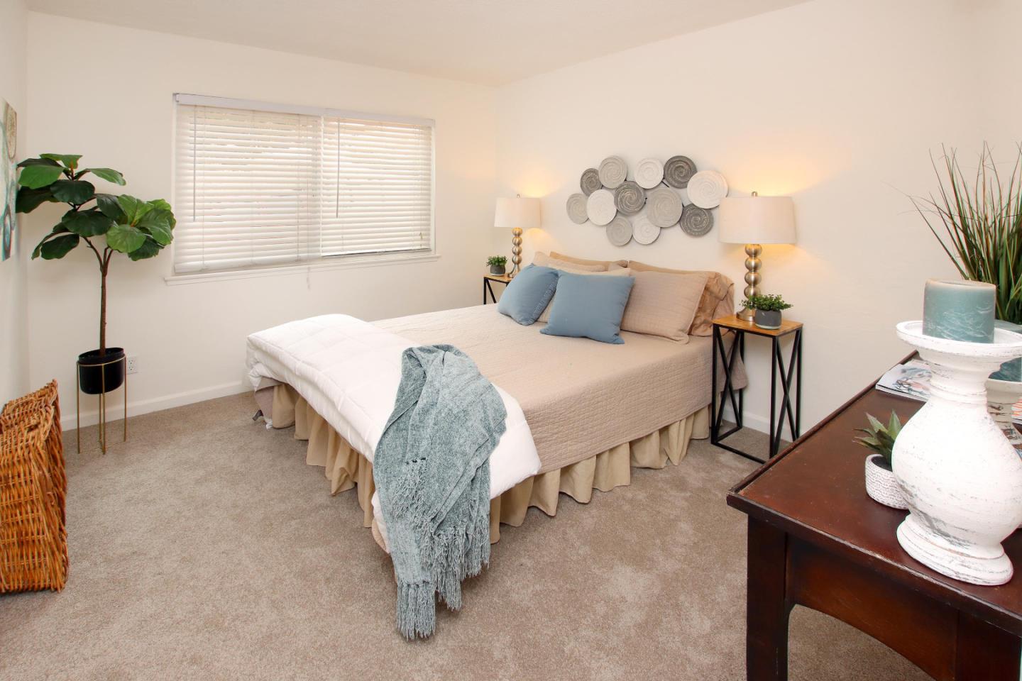 3005 Granite Creek Road Scotts Valley, CA 95066 - Photo 21 of 26 a bedroom with a bed and a potted plant