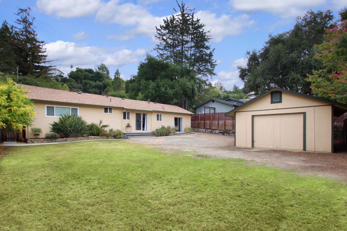 3005 Granite Creek Road Scotts Valley, CA 95066 - Photo 25 of 26 a front view of a house with a yard and trees