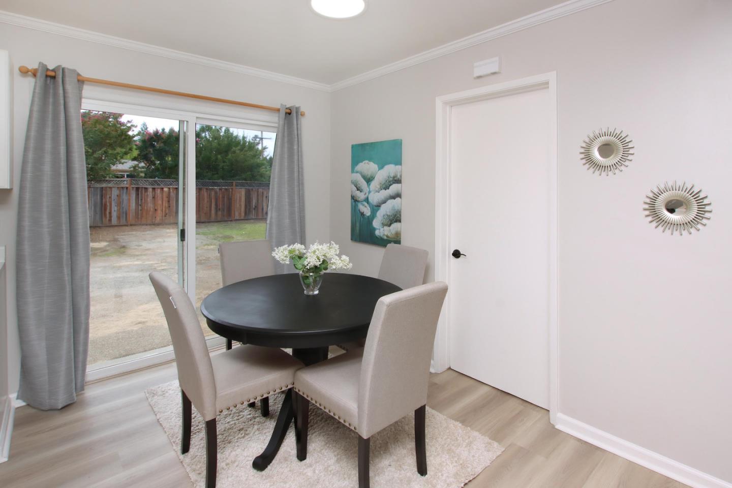 3005 Granite Creek Road Scotts Valley, CA 95066 - Photo 7 of 26 a dining room with furniture and wooden floor