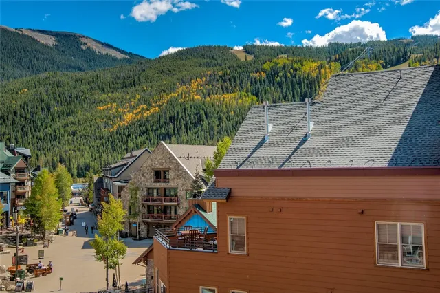 a backyard of a house with seating space