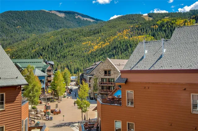 a aerial view of a house with a yard