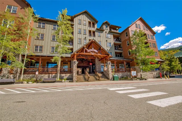 a front view of a building and a yard