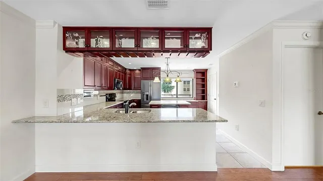 a bathroom with a sink and a washer dryer