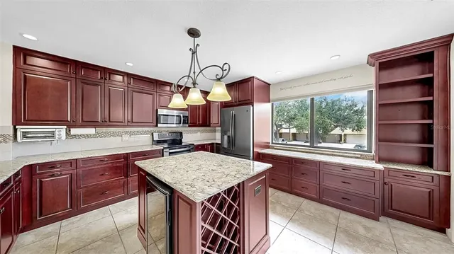 a view of a storage & utility room with a window