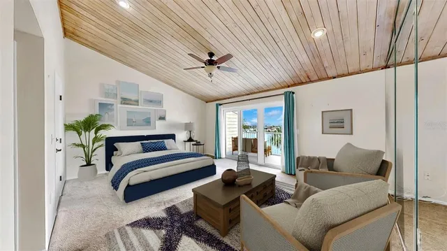 a view of a house with a patio and a yard