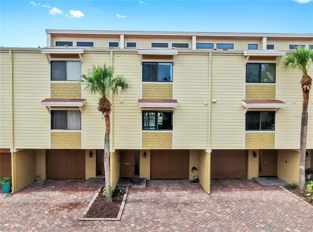 a view of a balcony with wooden floor