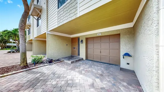 a view of a balcony with wooden floor