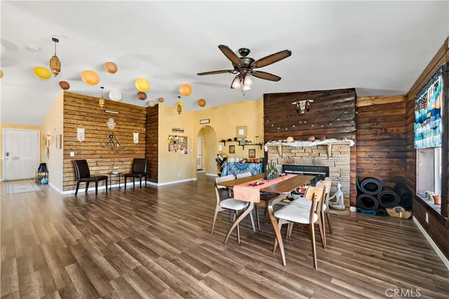 a kitchen with granite countertop stainless steel appliances and wooden cabinets